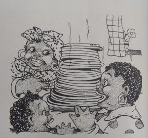 The family gathers round for a feast of pancakes